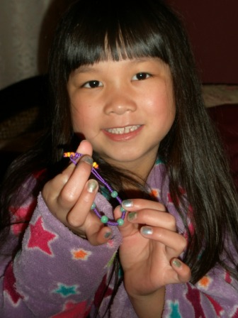 Kasen with her bracelet